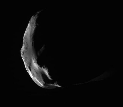 Снимки спутника Елена , которые выполни зонд "Кассини" 18 июня 2011 года. Фото NASA/JPL-Caltech/Space Science Institute 