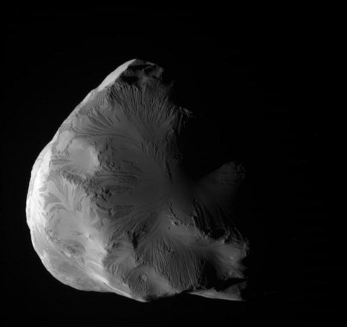 Снимки спутника Елена , которые выполни зонд "Кассини" 18 июня 2011 года. Фото NASA/JPL-Caltech/Space Science Institute 