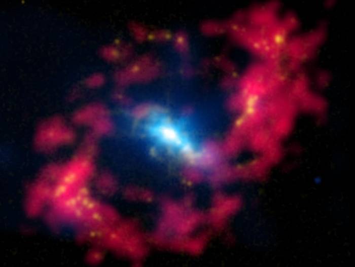Центр галактики NGC 4151. Фото X-ray: NASA/CXC/CfA/J.Wang et al.; Optical: Isaac Newton Group of Telescopes, La Palma/Jacobus Kapteyn Telescope, Radio: NSF/NRAO/VLA