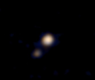 Первый цветной снимок системы Плутон-Харон. 