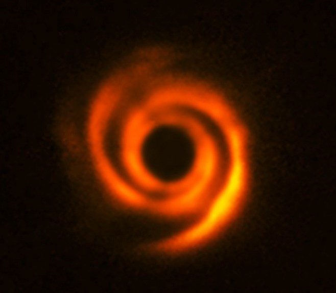 Протопланетный диск вокруг звезды HD135344B.