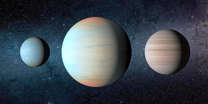 Художественное изображение трех планет системы Kepler-47.
